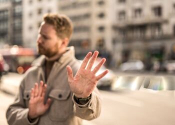A man refusing help from someone