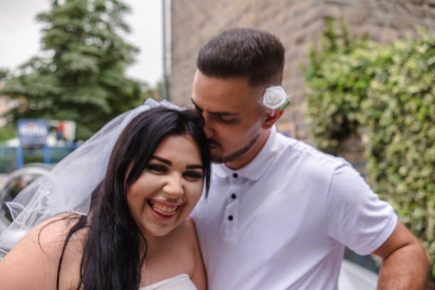 A beautiful woman and her husband just after the wedding